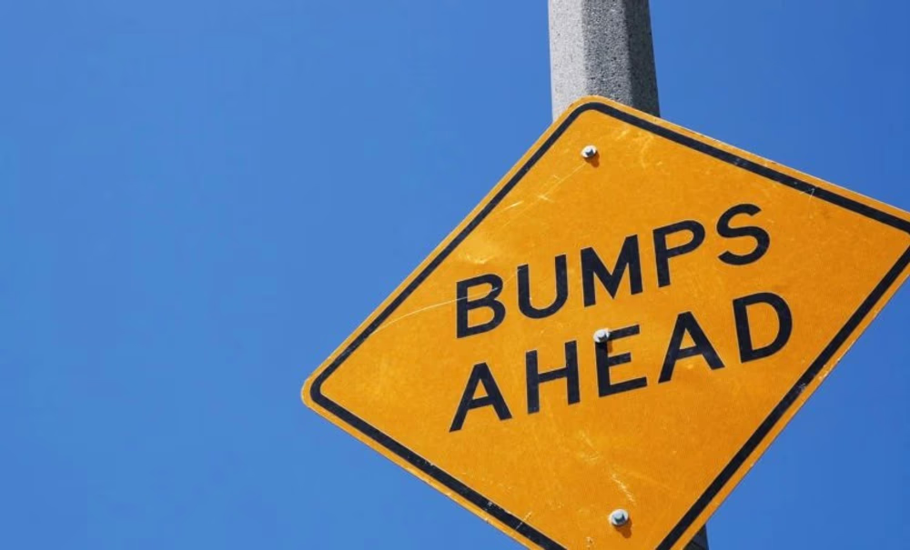 Bumps ahead road sign